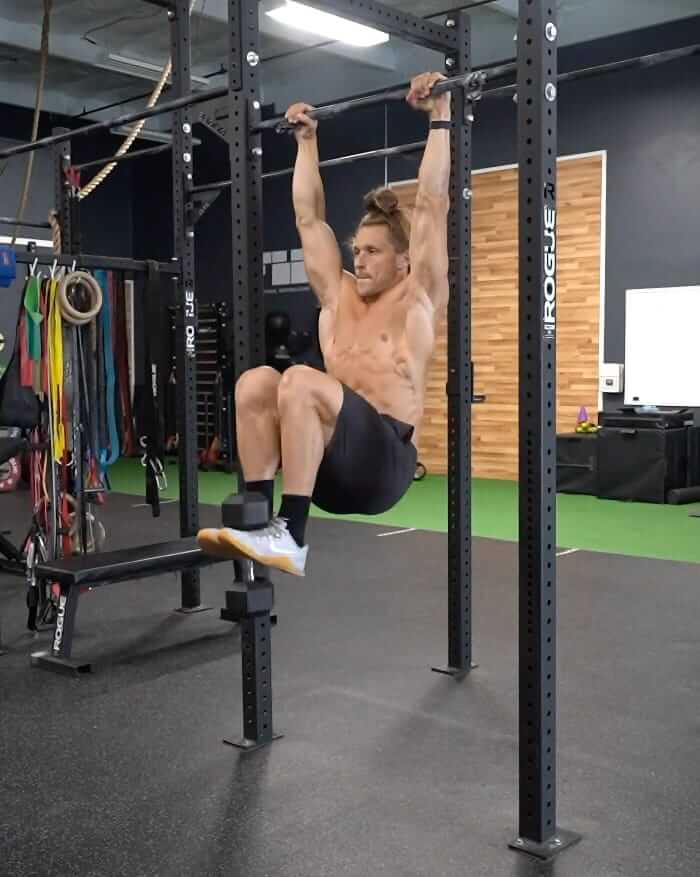 Dumbbell Hanging Knee Tuck Exercise