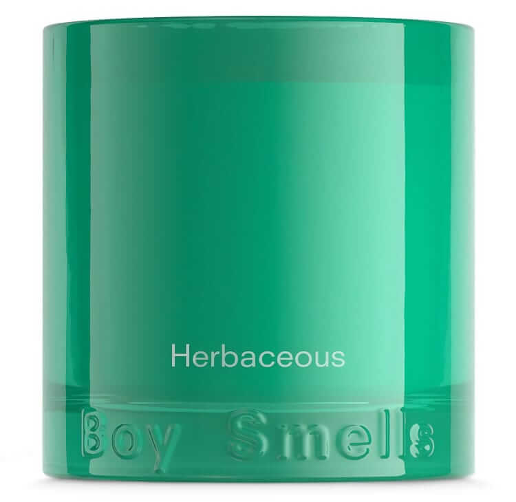 boy smells herbaceous candle