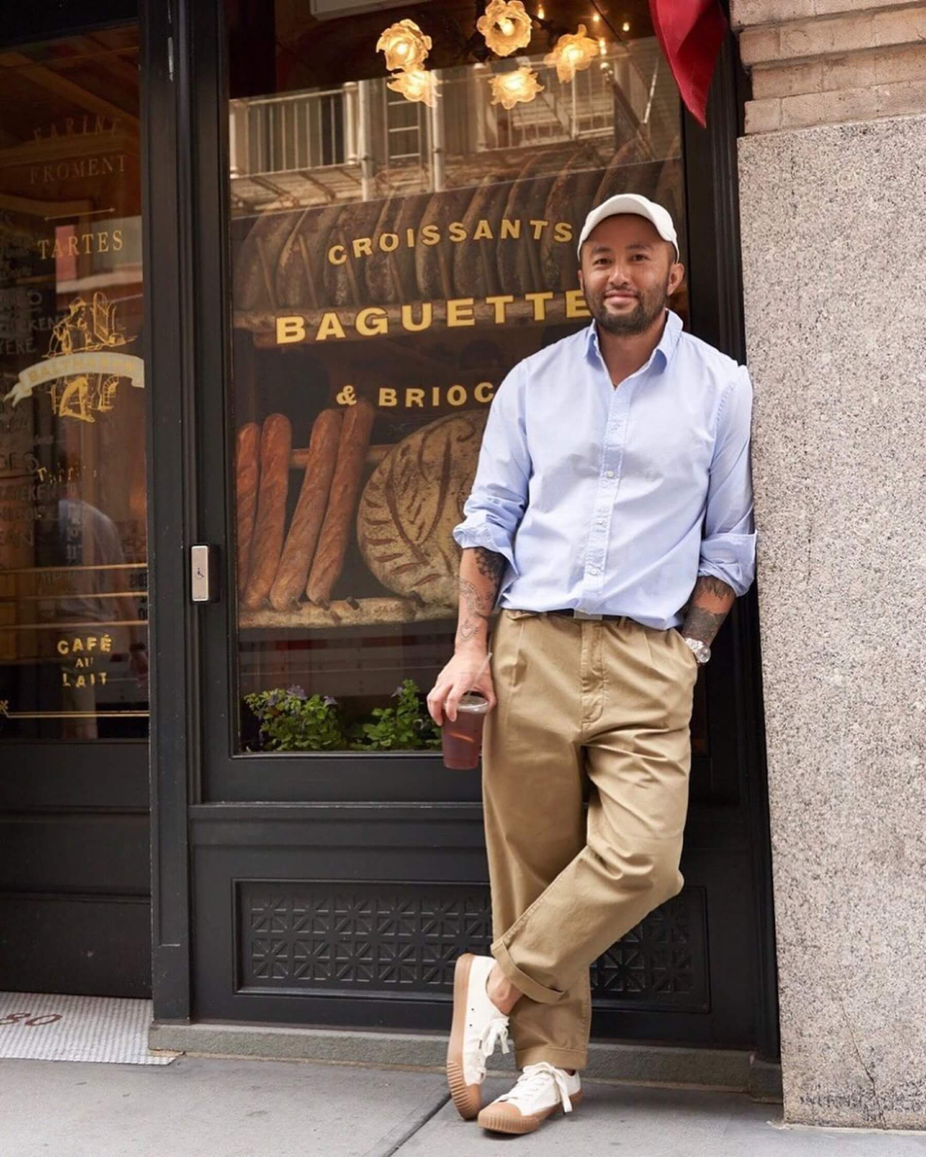 Somsack Sikhounmuong of Alex Mill wearing pleated chinos