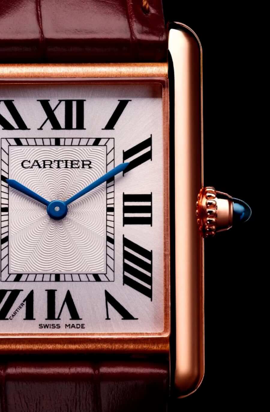 18k Gold Cartier Tank watch close-up